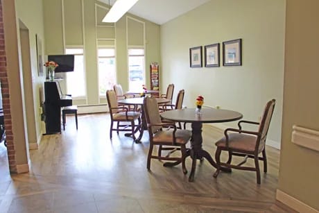 Bright common area with tables and chairs