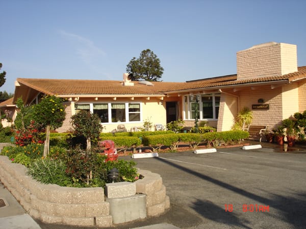 Exterior view of Anjelica's Villa with gardens and entrance