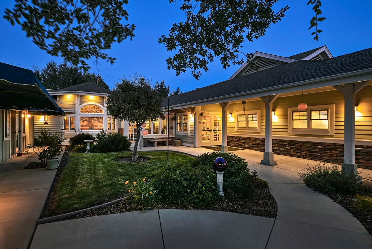 Exterior view of Solvang Friendship House at dusk