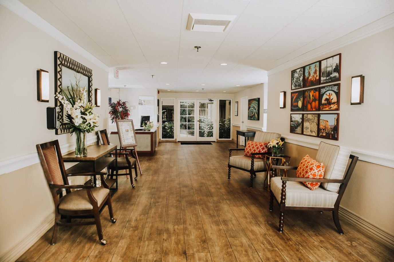 A bright common area with seating and decorations