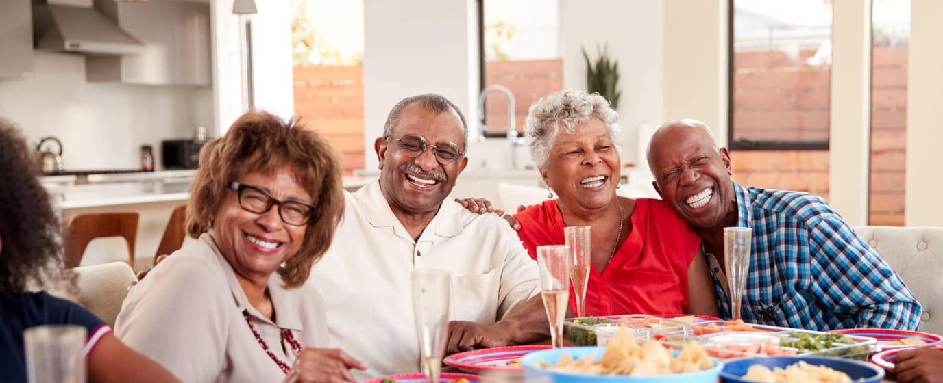 Residents enjoying a meal together in a common area