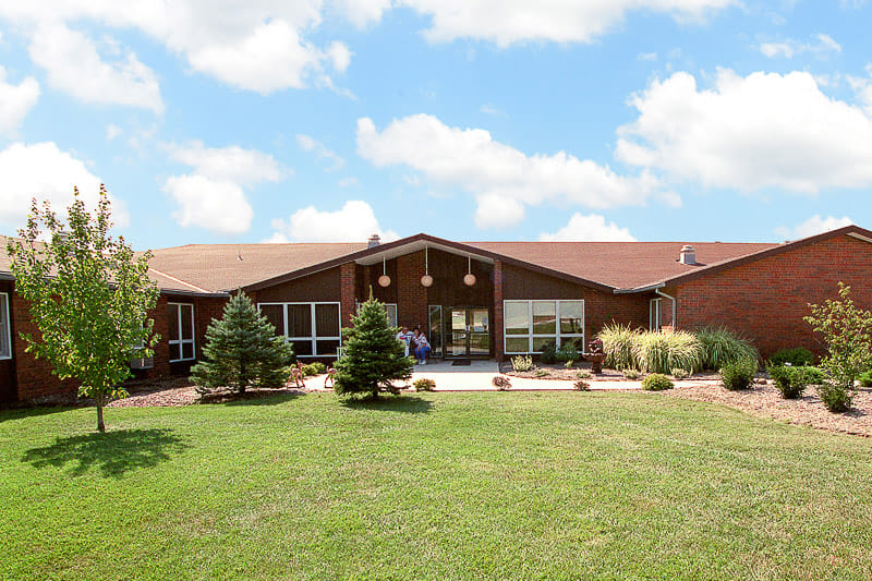 Exterior of Life Care Center of Seneca with landscaped areas