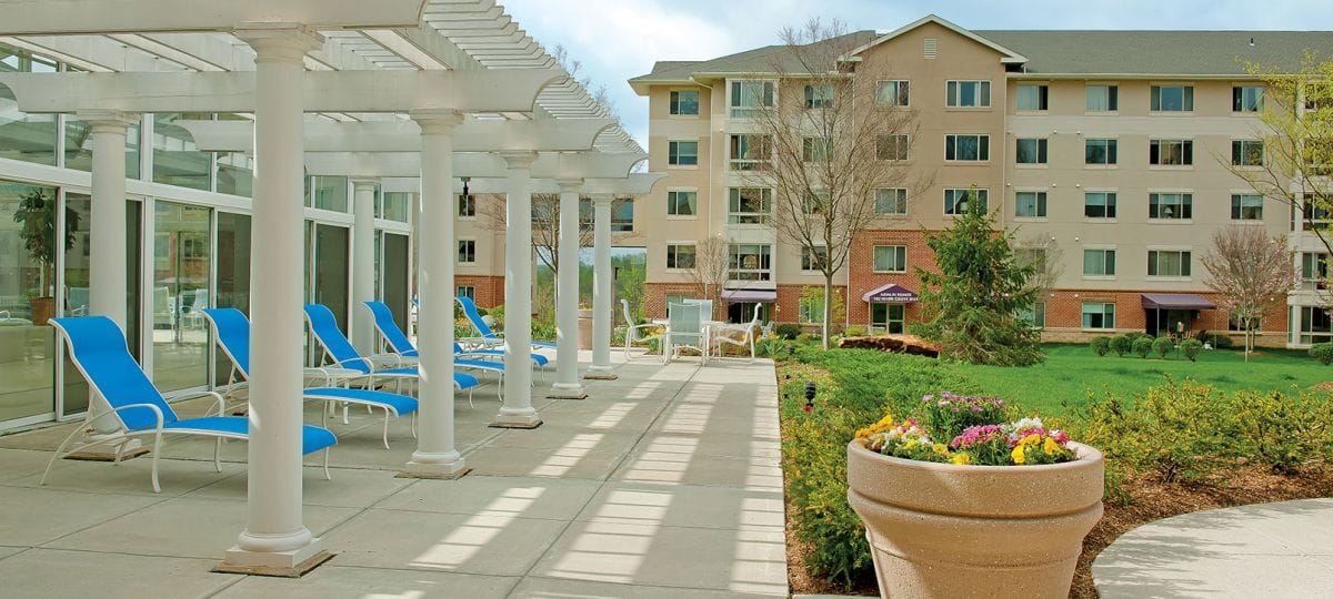 Outdoor patio with seating and landscaping