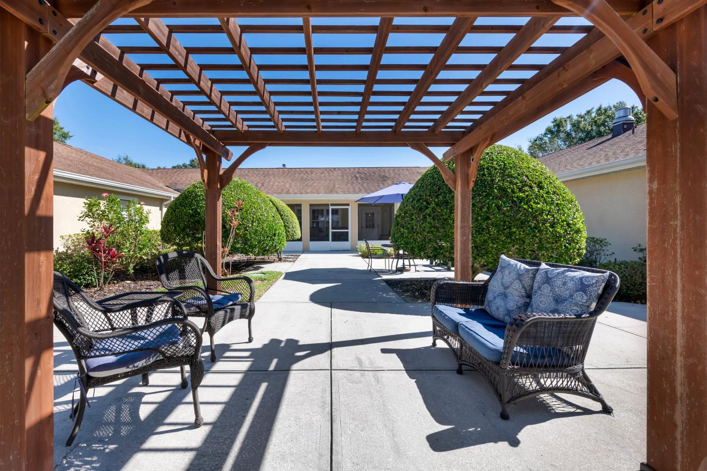 Outdoor seating area under a pergola
