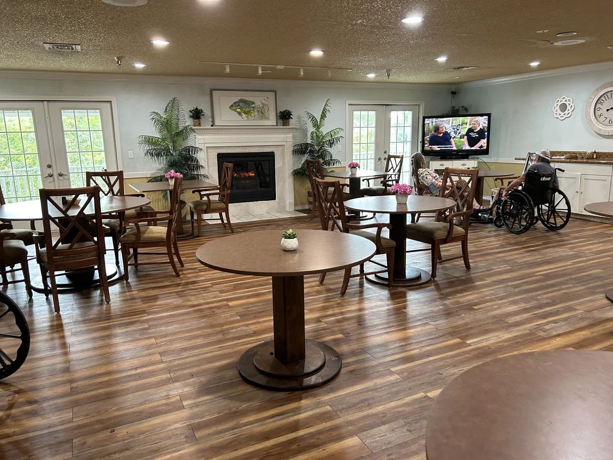 Interior dining area with tables and a television