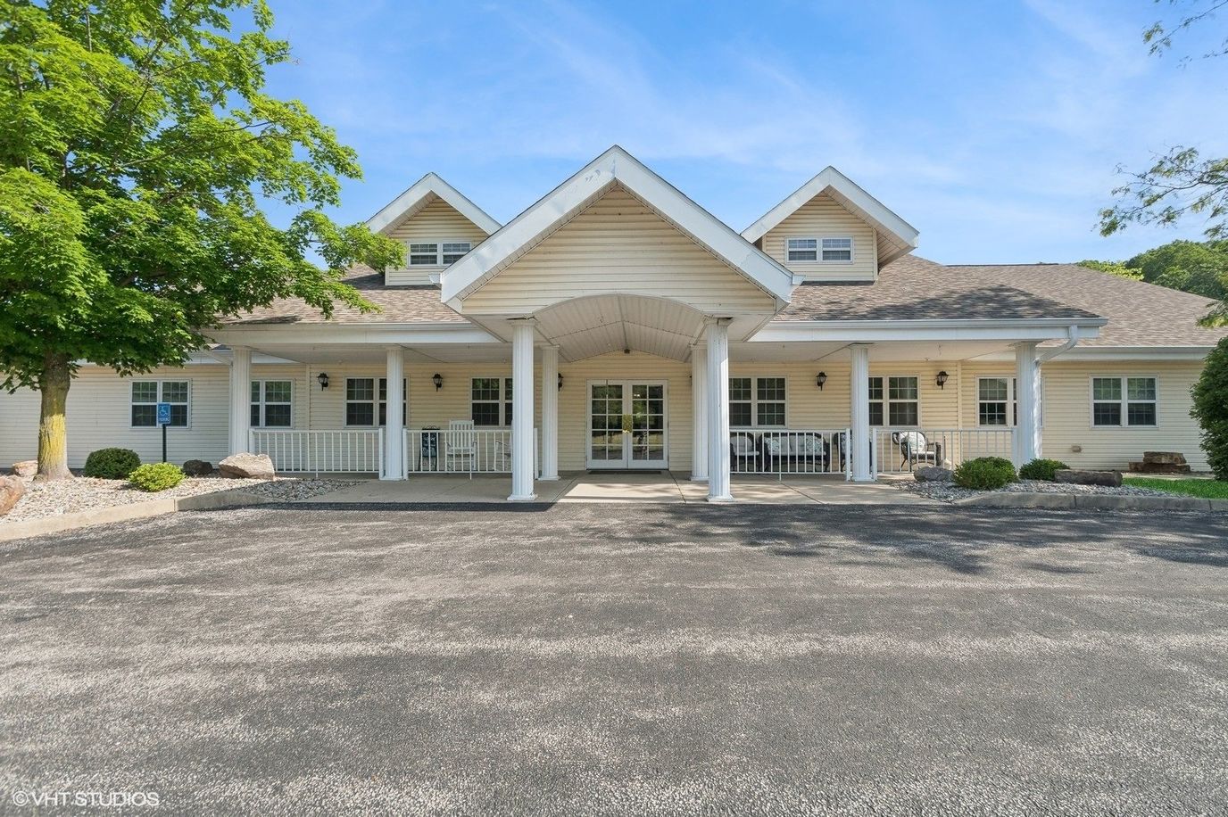 Exterior view of Tipton Place with entrance and landscaping
