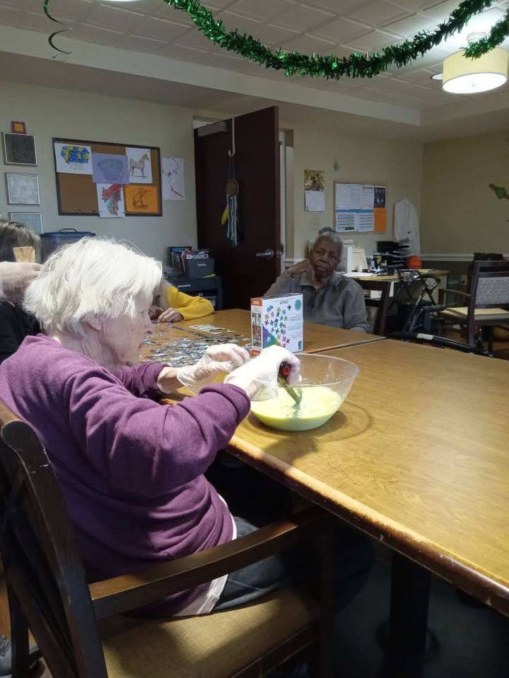 Residents engaging in an activity in a common area
