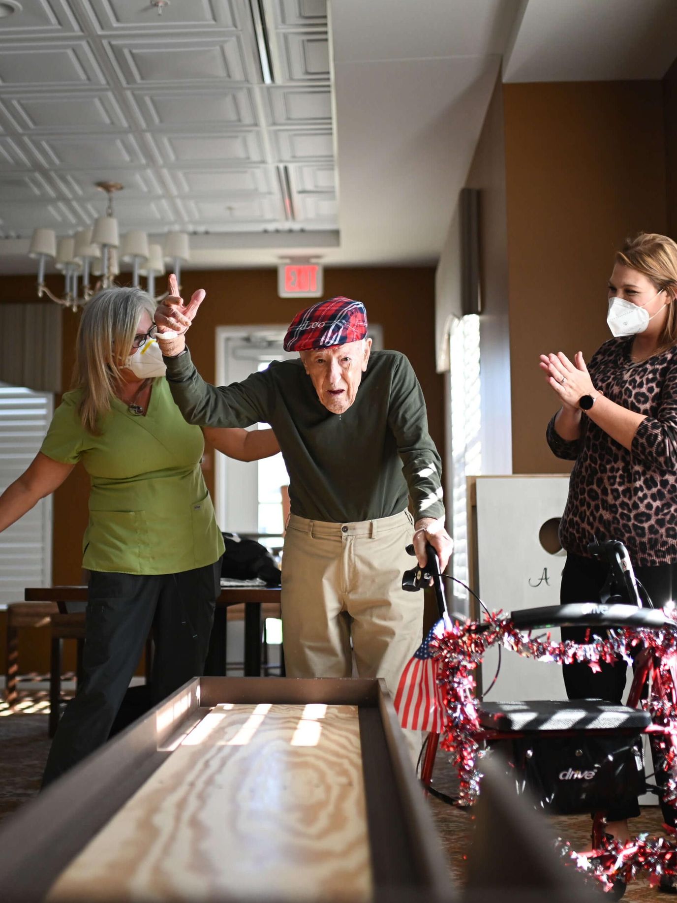 Residents and staff engaging in an indoor activity