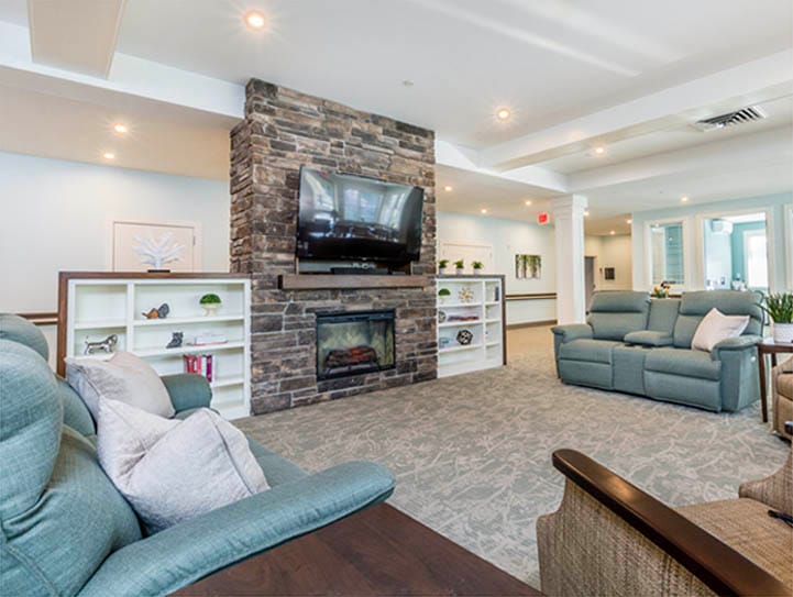 Comfortable lounge area with a fireplace and seating