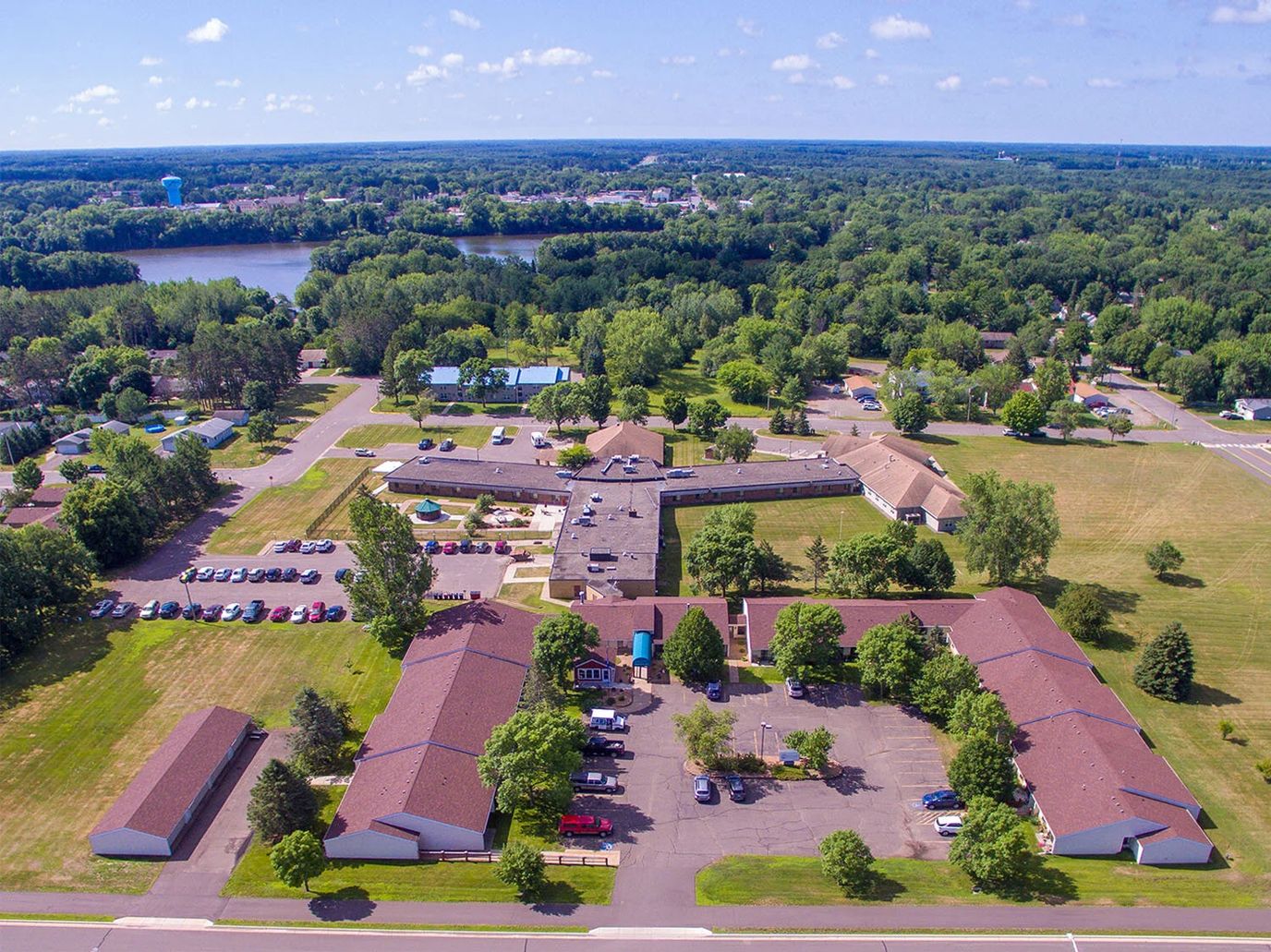 Aerial view of Villages Of St Clare campus surrounded by greenery