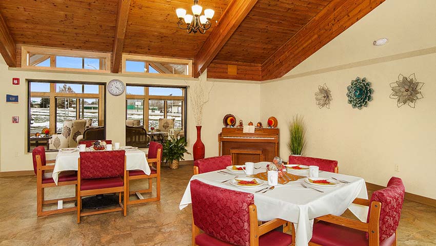 Dining area with tables set for meals