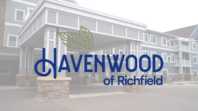 Facility logo in front of the building entrance