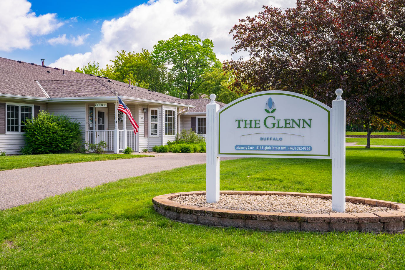 Exterior view of The Glenn facility with signage