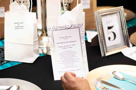 Event decoration with menu display at dining table
