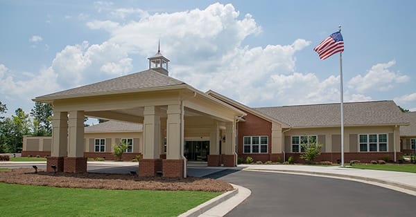 Exterior view of the facility with American flag