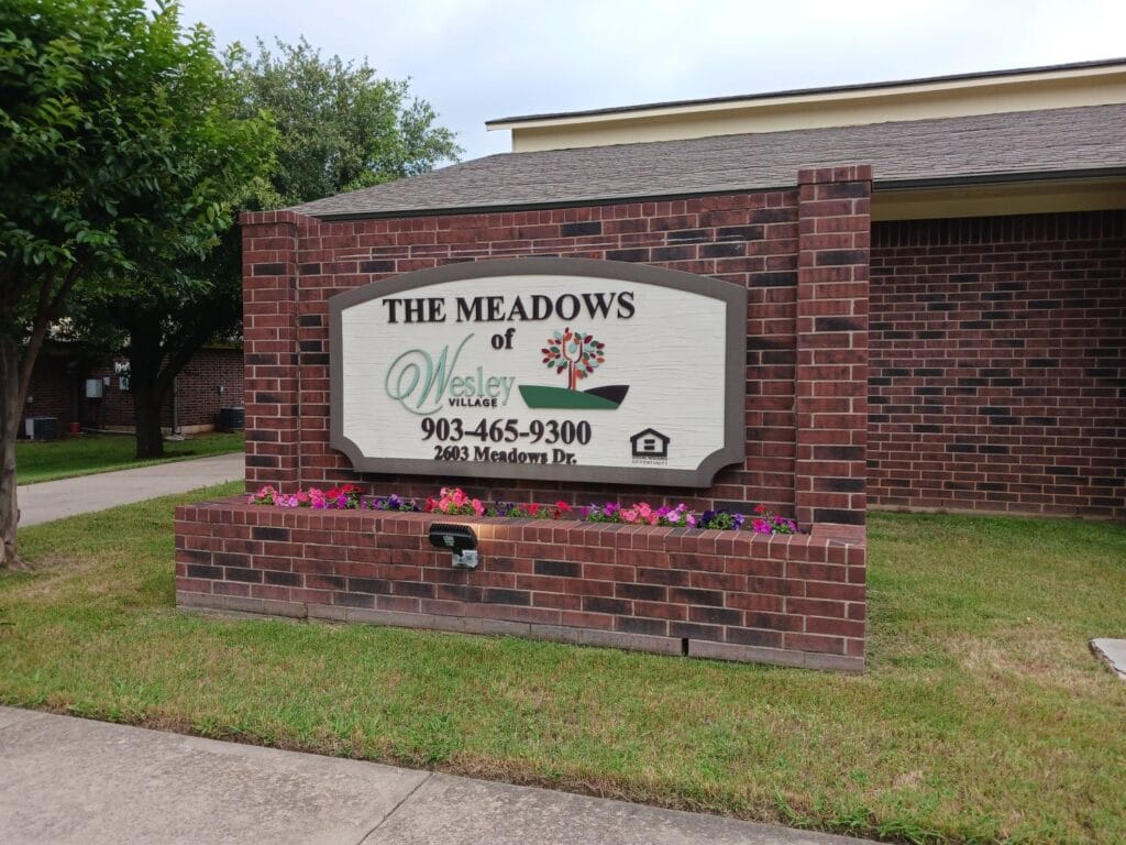 Sign for Wesley Village Retirement Home