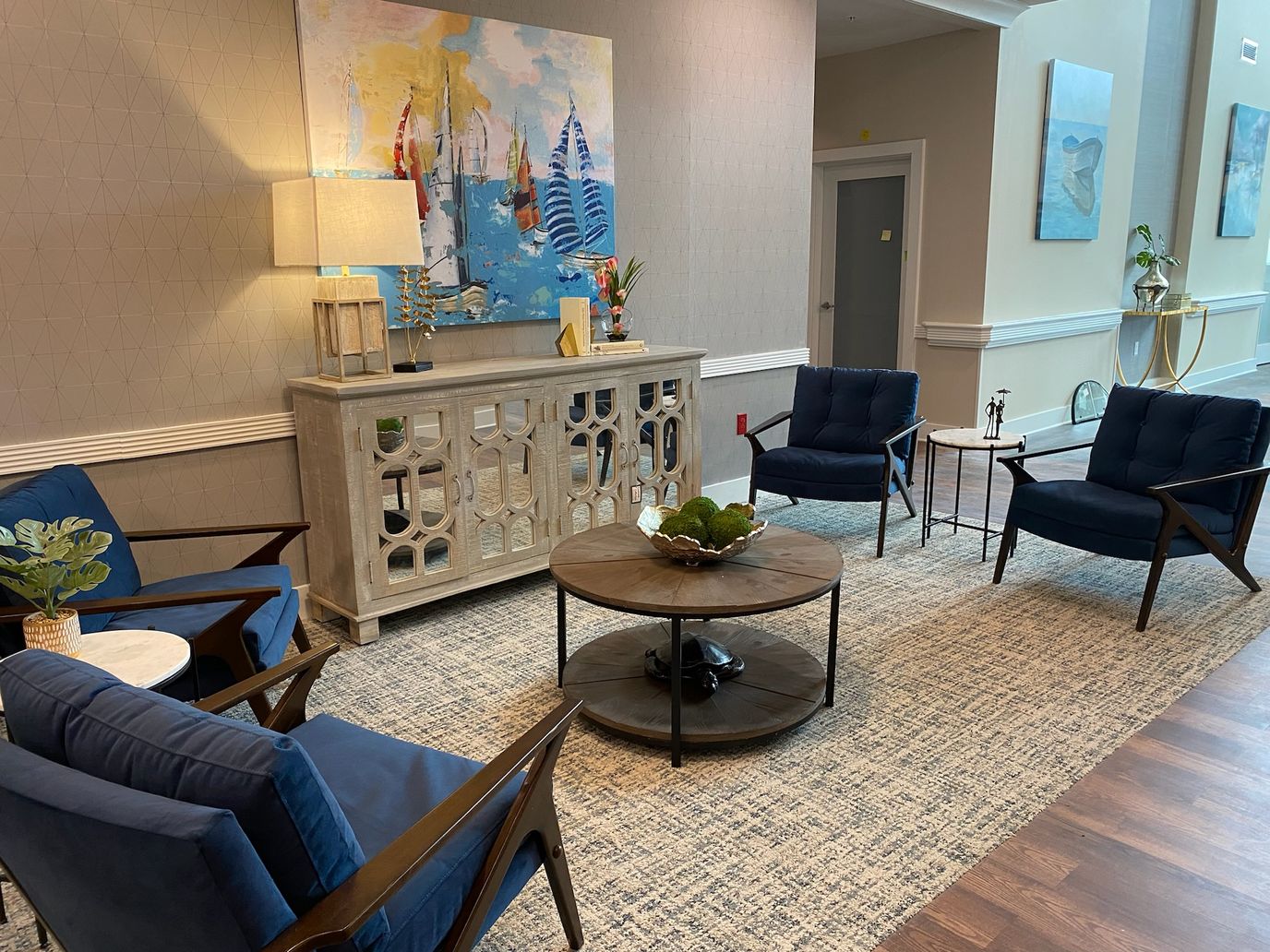 Cozy common area with modern furniture and artwork