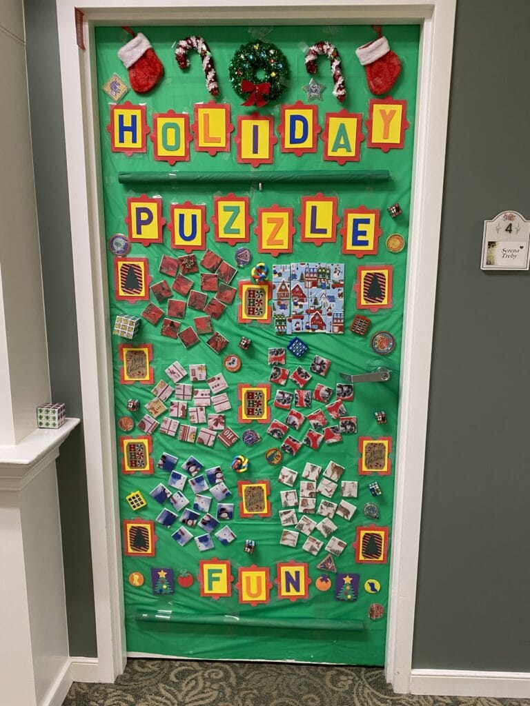 Festive holiday-themed puzzle door decoration