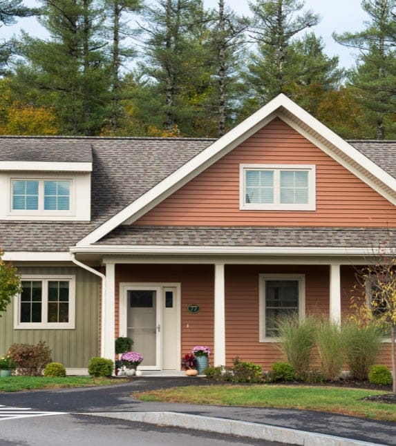 Exterior view of a residential-style facility with landscaping