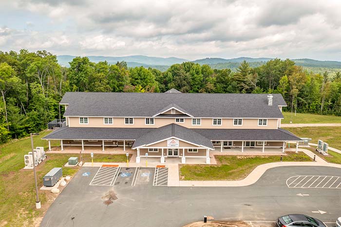 Aerial view of the assisted living facility with mountains in the background