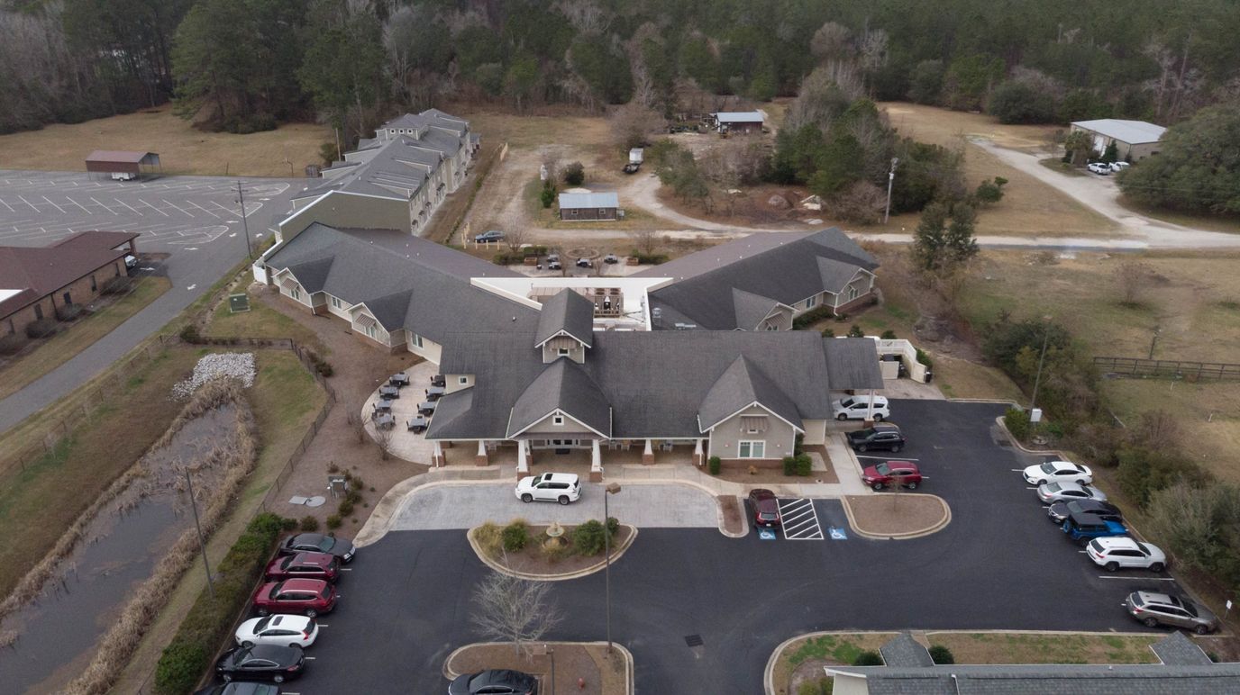 Aerial view of the Landings of Georgetown facility with parking.