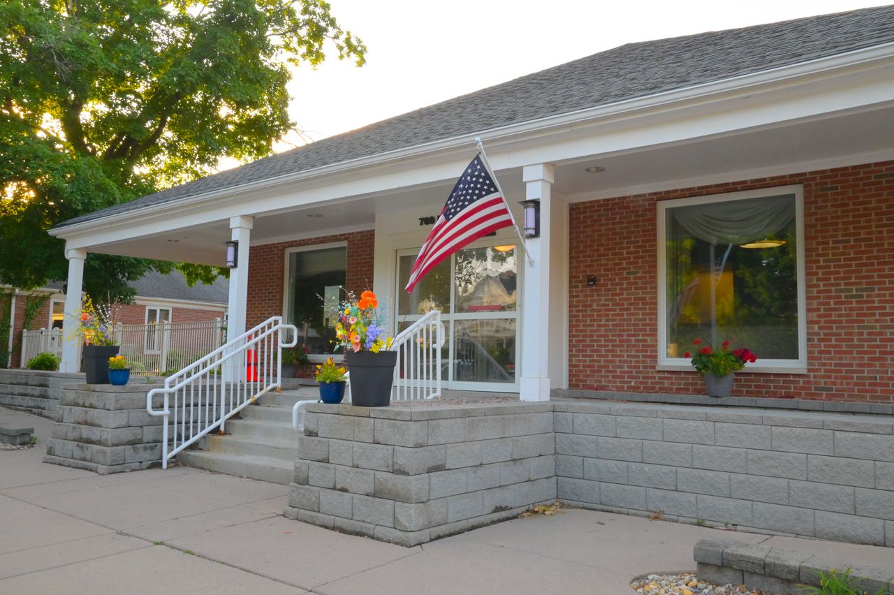 A welcoming entrance of a senior care facility