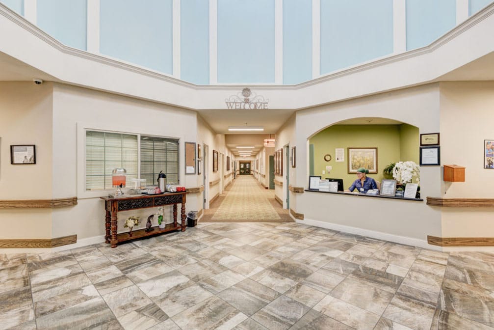 A welcoming lobby area with staff at reception