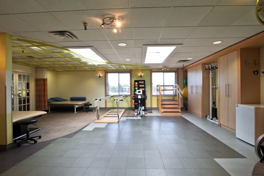 Interior view of a rehabilitation gym with equipment
