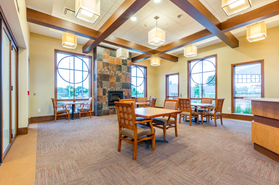 Bright common area with tables and chairs