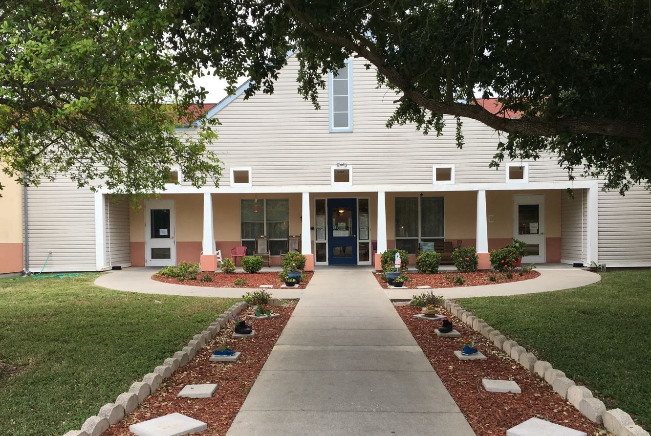 Exterior view of Villa Northwest with garden paths