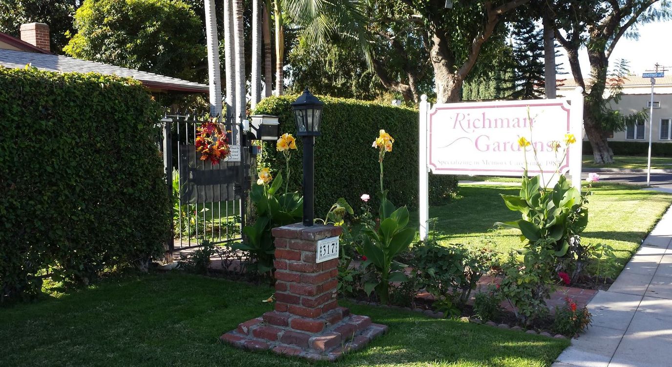 Exterior view of Richman Gardens sign and landscaping