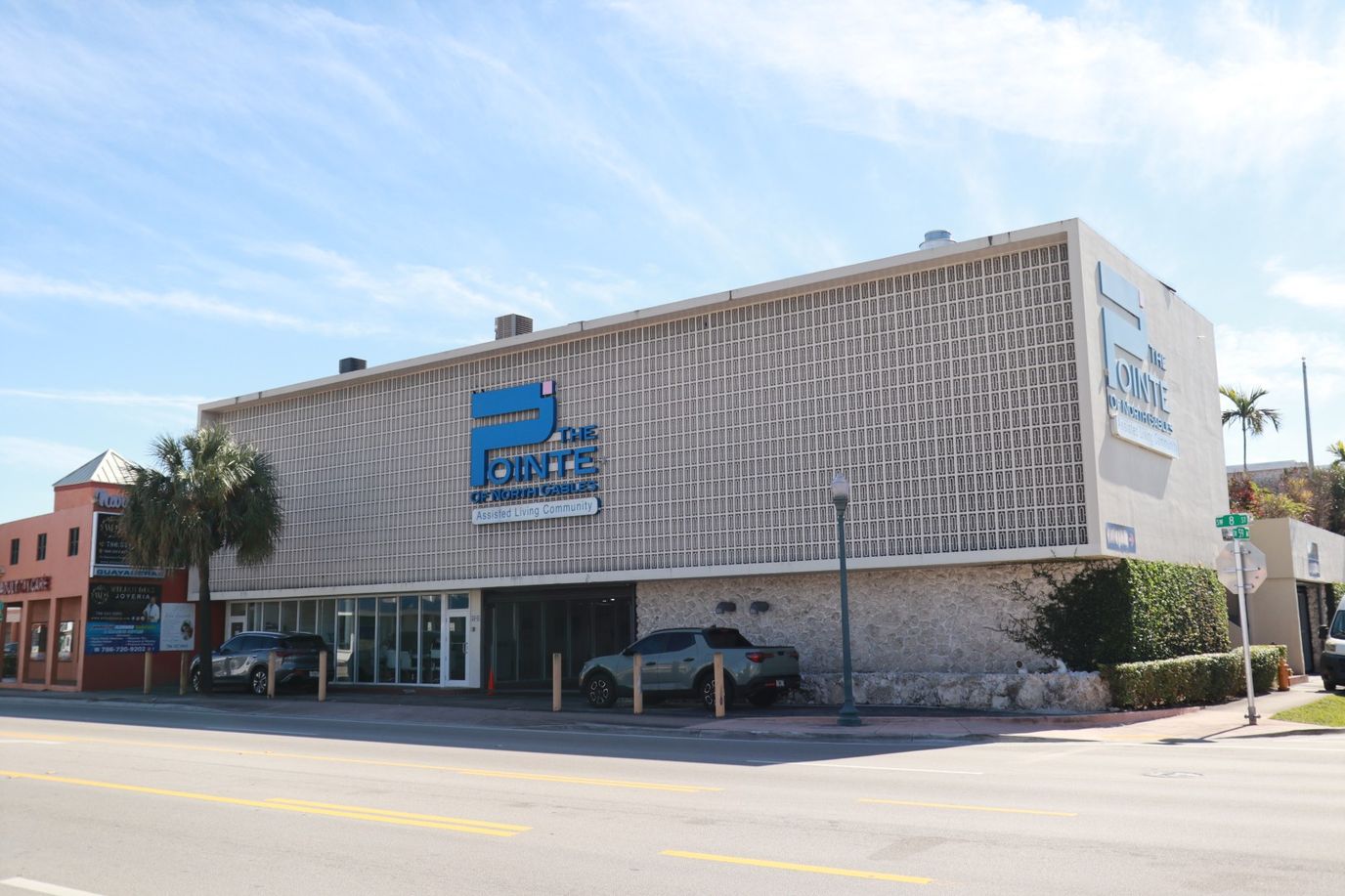 Exterior view of The Pointe of North Gables building
