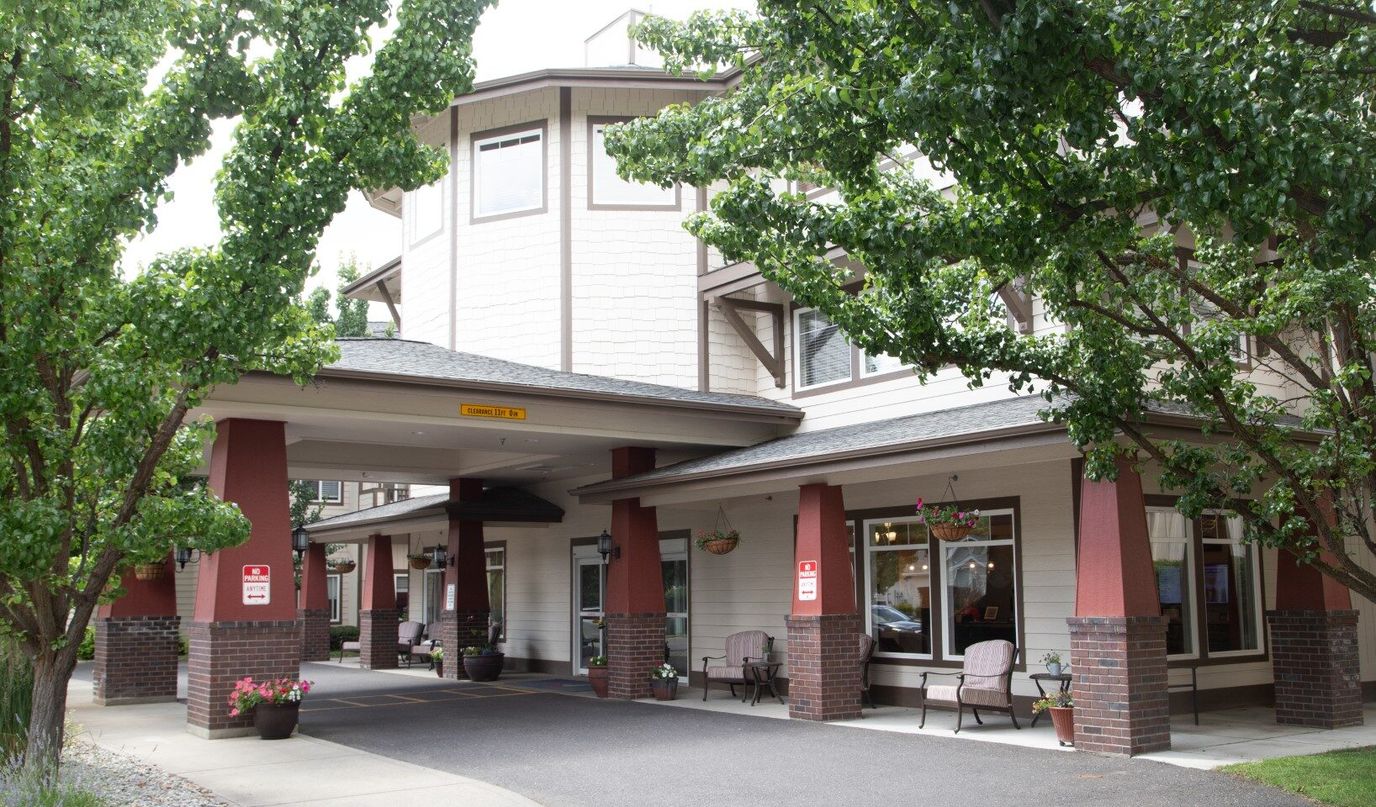 Front entrance of South Hill Village under trees