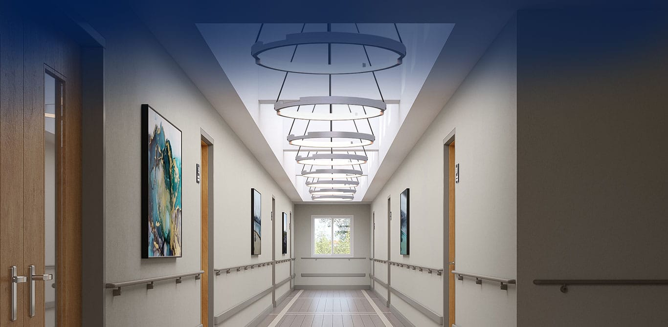 Well-lit hallway with modern lighting and artwork