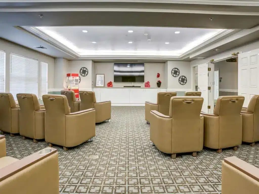 Interior seating area of a common room with soft chairs