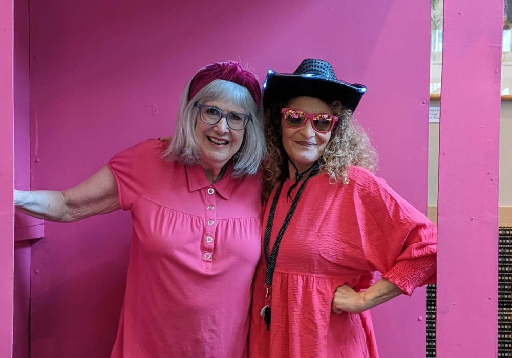 Two residents enjoying a fun photo together.