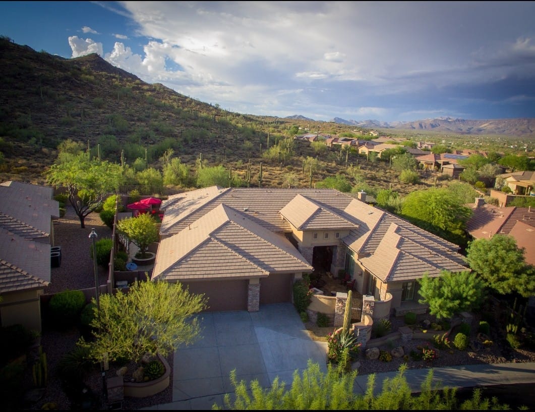Aerial view of a luxury senior care building in a mountainous area