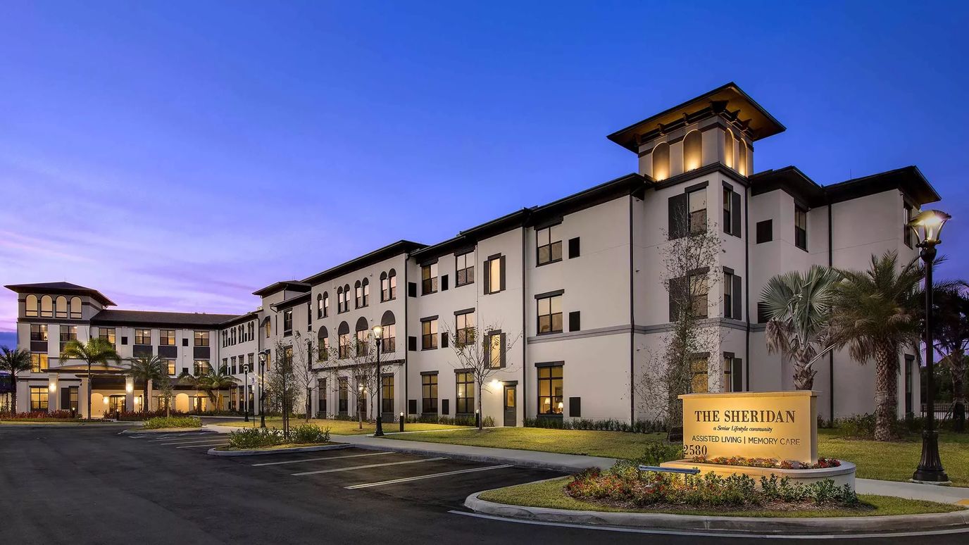 Exterior view of The Sheridan at Cooper City at dusk