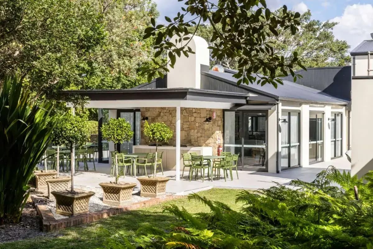 Outdoor space with seating and landscaping