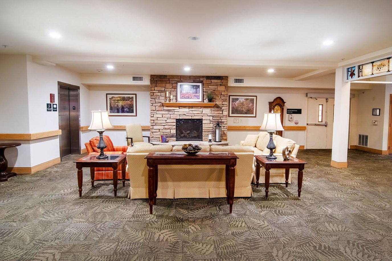 Cozy common area with comfortable seating and fireplace