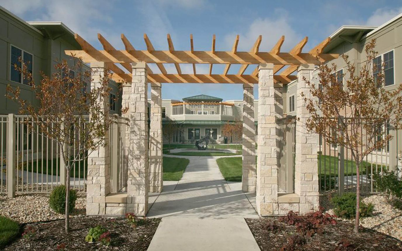 Beautifully landscaped entrance to the facility