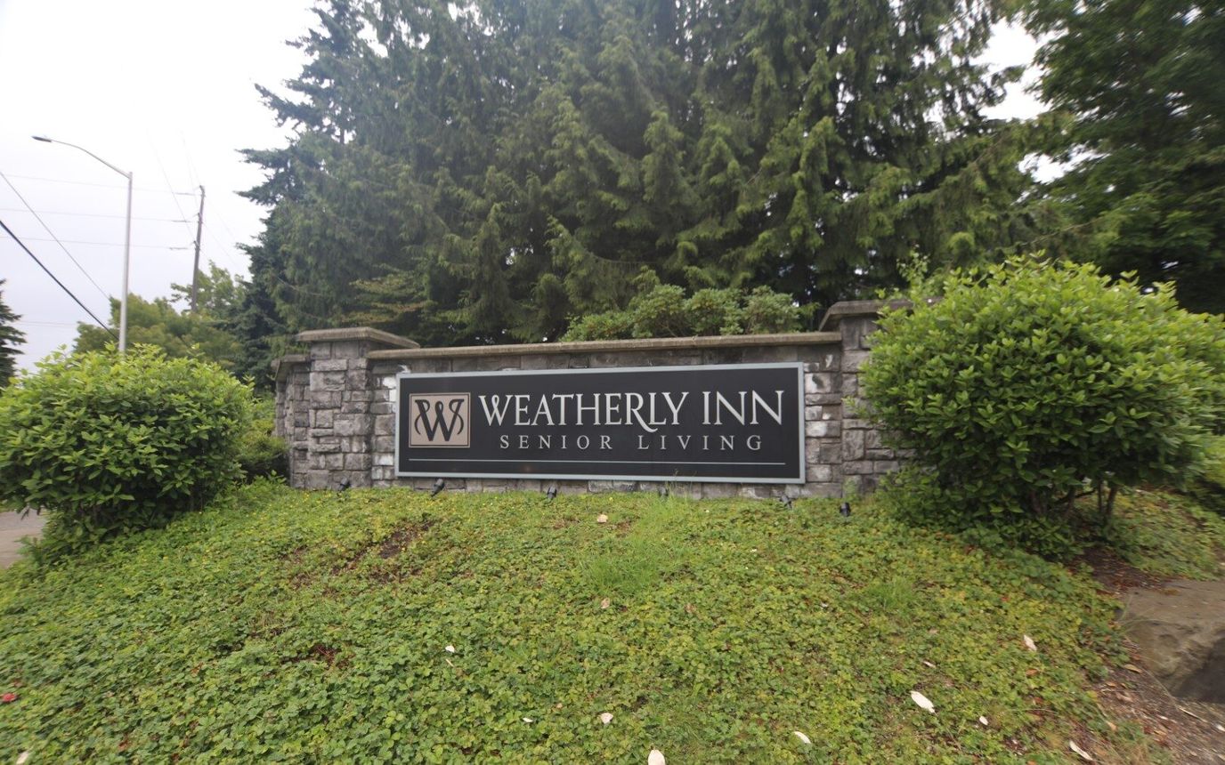 Facility sign for Weatherly Inn Senior Living