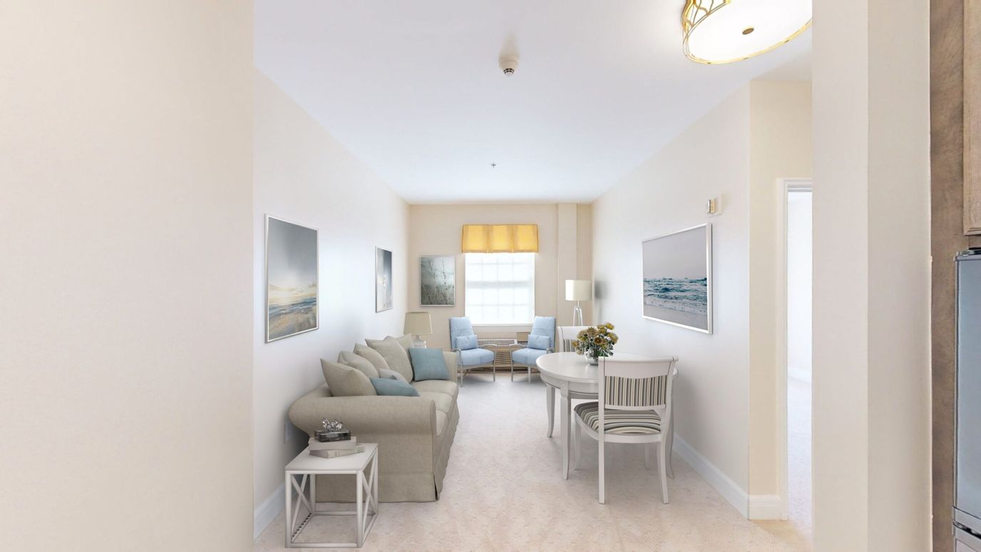 Bright interior living space with seating area and dining table