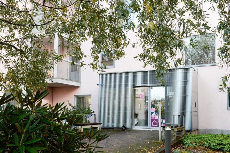 Exterior view of a modern assisted living facility entrance