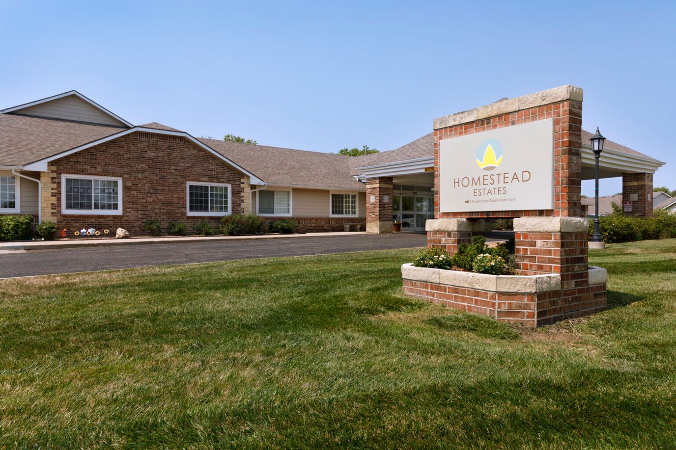 Exterior view of Homestead Estates with signage