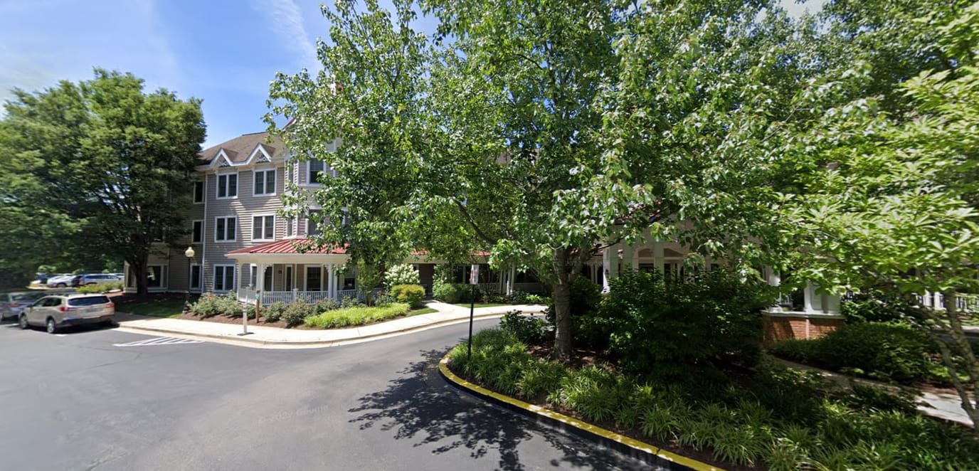 Exterior view of Kensington Park with greenery