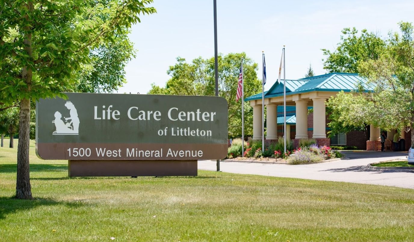 Exterior view of Life Care Center of Littleton with signage