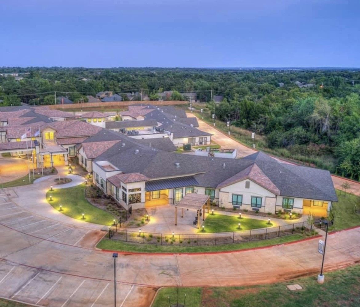 Aerial view of Parc Place Medical Resort's exterior and landscaping