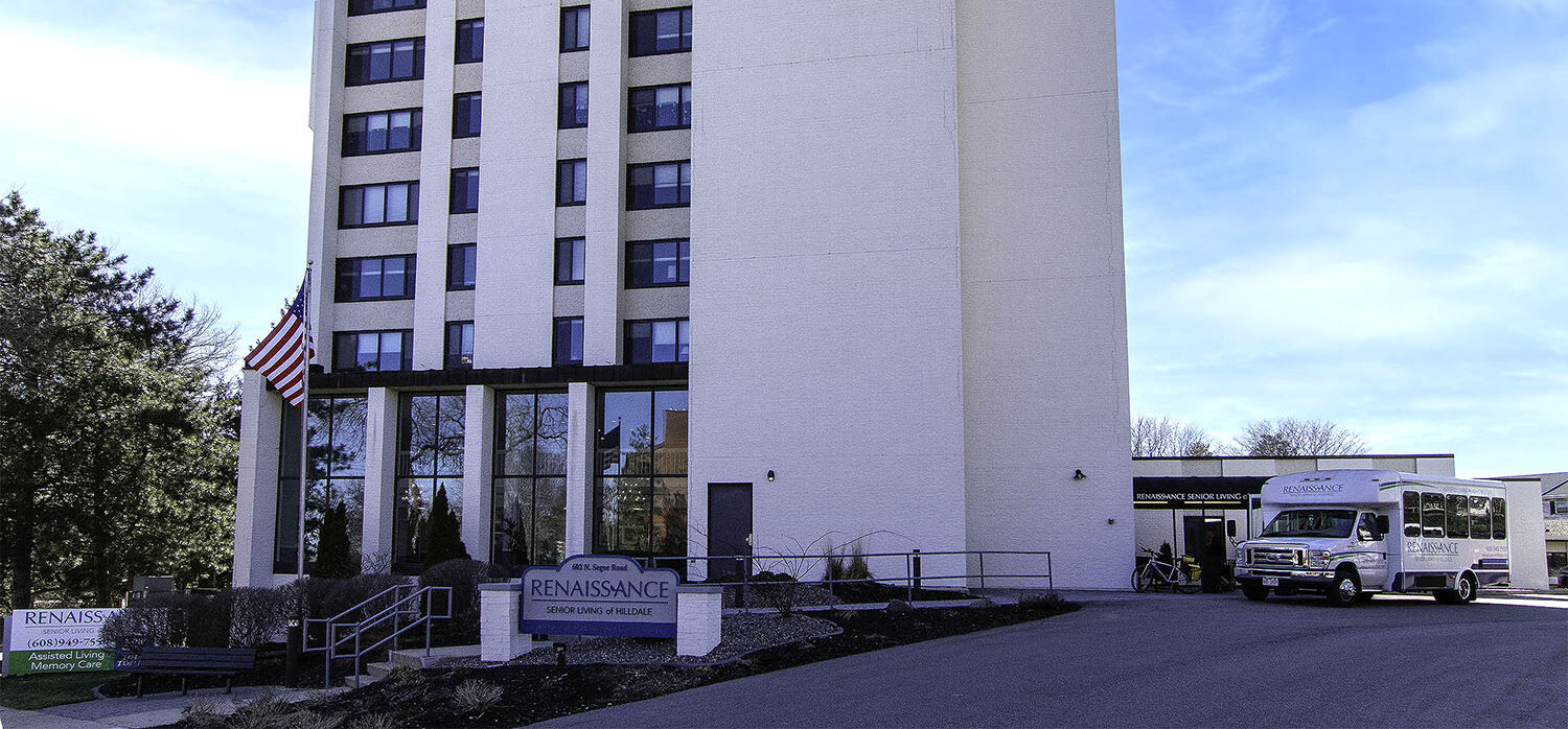 Exterior view of Renaissance Senior Living with a facility shuttle