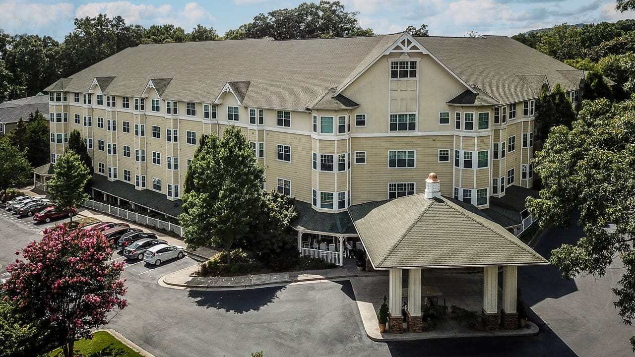 Aerial view of the Winnwood Retirement Community building and entrance.